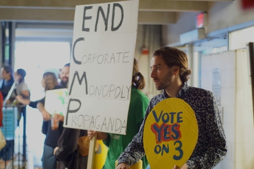 Will Mainers vote their two biggest utilities out? Supporters of the Our Power campaign protested outside a Chamber of Commerce event on Sept. 14 that only featured opponents of the Pine Tree Power initiative.