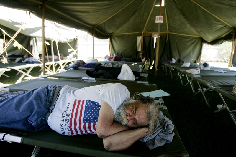 A homeless veteran sleeps in a tent. (Photo by Sandy Huffaker/Getty Images)