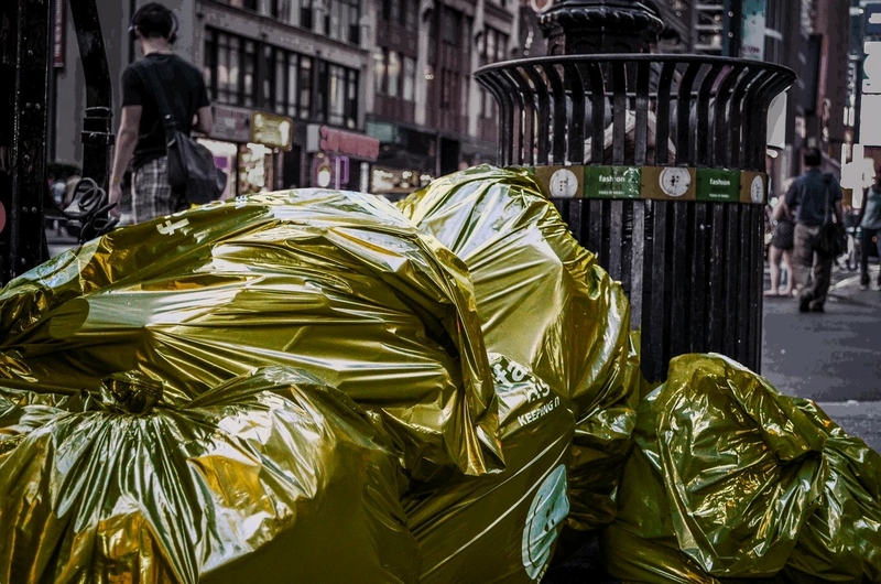 New York state produces so much trash, it's running out of places to put it. | Photo: m01229 via Flickr / Illustration: Maia Hibbett