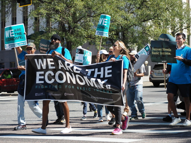 Basic income saved lives, say supporters, who rally in Denver for extension of cash assistance Basic income saved lives, say supporters, who rally in Denver for extension of cash assistance