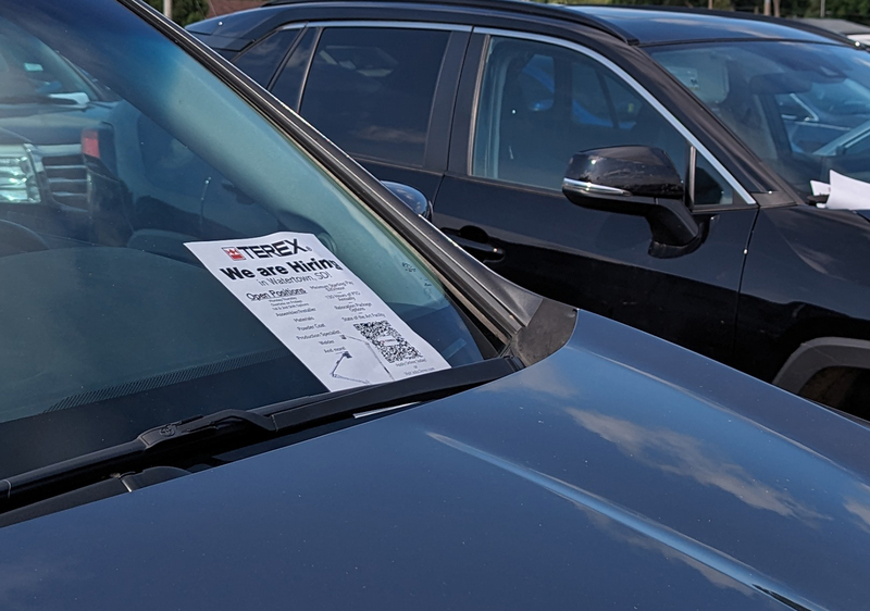 Desperation and renewal: How Huron embraced new Americans and thrived A flyer on a vehicle announcing job openings, as seen in the parking lot of the Huron Soccer Complex. The complex was hosting a soccer tournament for the Karen ethnic group. (John Hult/South Dakota Searchlight)