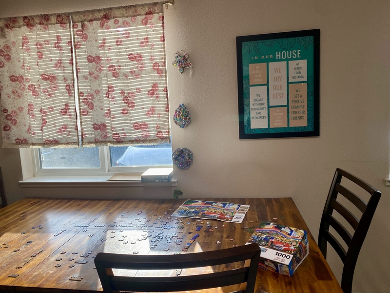 Alaska does not have enough housing to keep survivors of domestic violence safe A puzzle is half completed in the communal part of a supportive housing complex in Fairbanks, Alaska on September 14, 2023. (Photo by Claire Stremple/Alaska Beacon