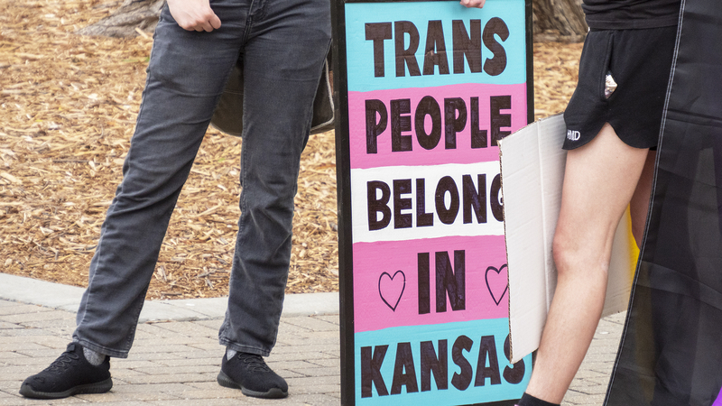 Transgender Kansans and their allies rally May 5, 2023, at the Statehouse in Topeka in protest of the "women's bill of rights."